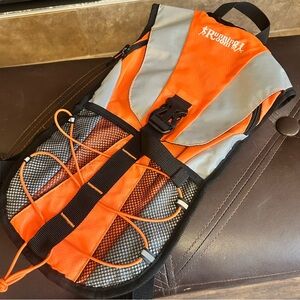 Running Room Orange and Gray Men's Hydration Pack.